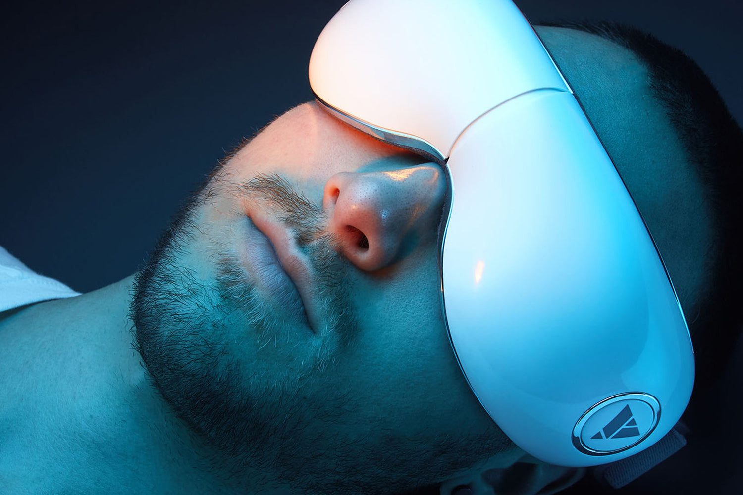 Young male using Vortix Eye Massager